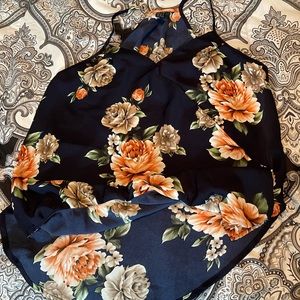 Blue flowery top.  Too big.  Just tried on.